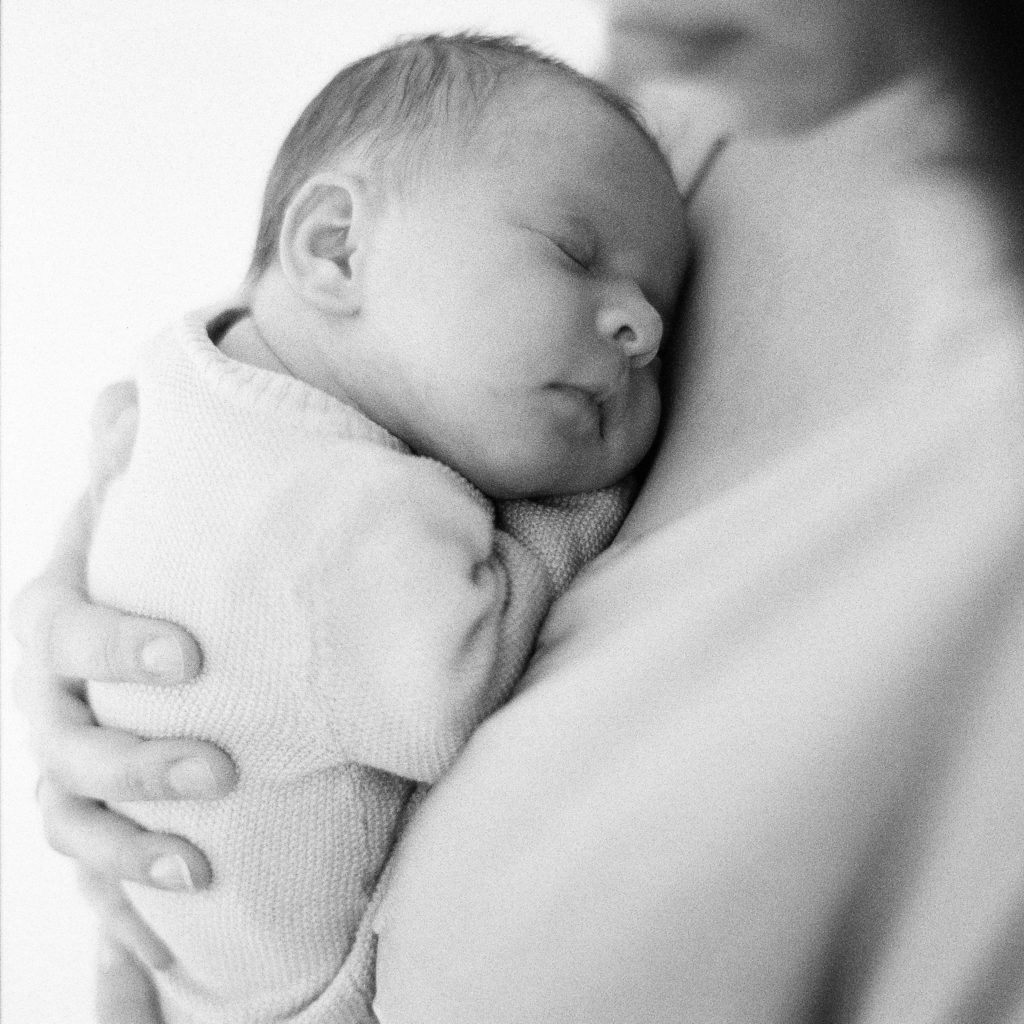 At Home Newborn Pictures on Black and White Film by Photographer in NYC and Connecticut Tiffany Farley