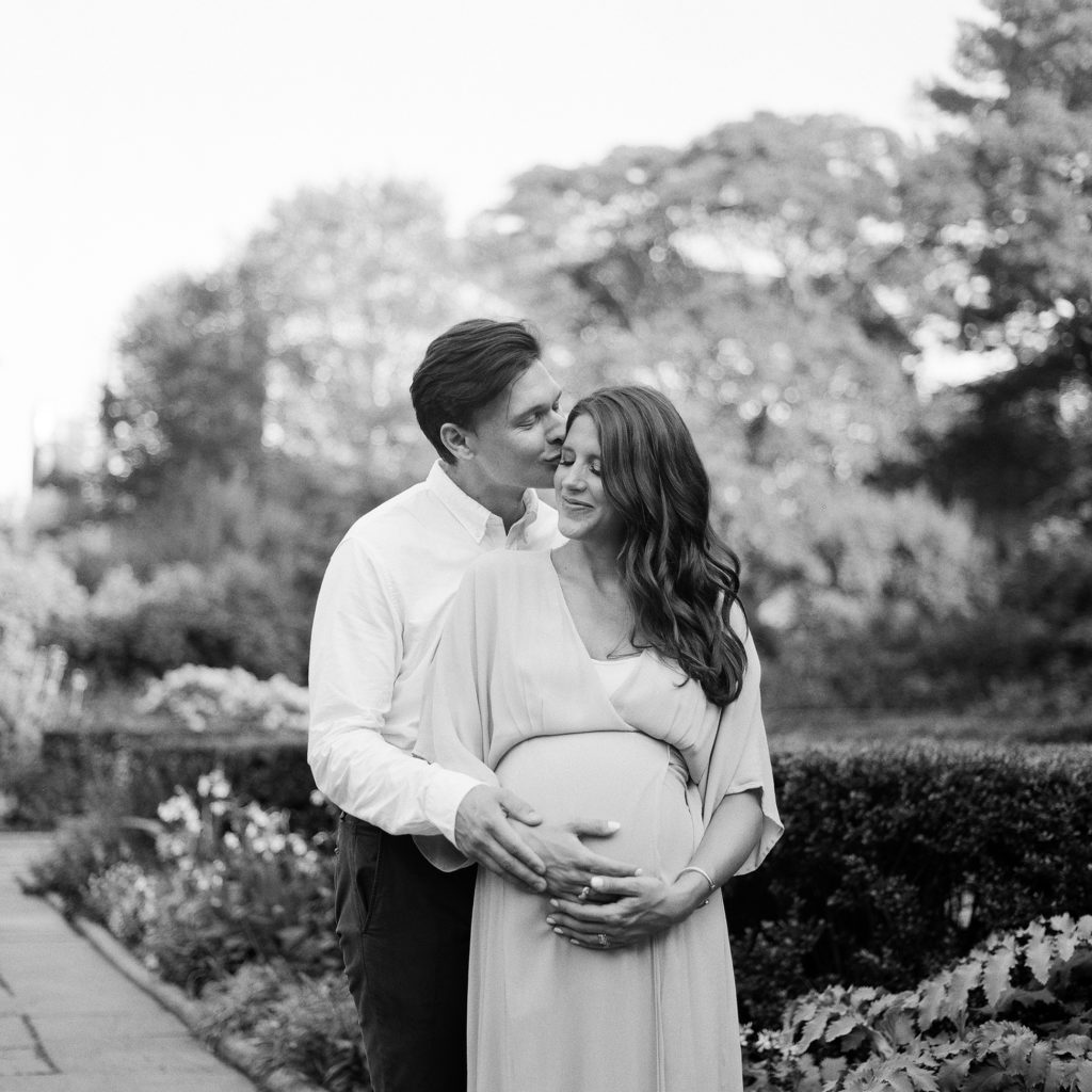 Manhattan NYC black and white maternity photography in the Conservatory Gardens by Tiffany Farley. 
